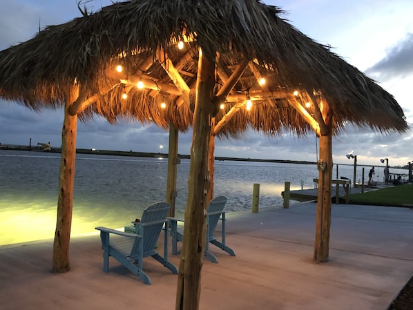 Enjoy night fishing, or the gulf breeze and a glass of wine. 