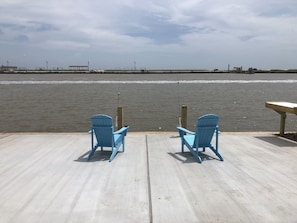 Catch fish from the back patio. Post have rod holders