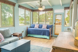 The sunroom (main entry to house) has a twin daybed and its own HVAC unit.