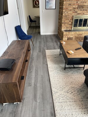 Another angle of the family/living room, shows opening to kitchen