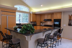 Full service kitchen stocked with essentials to make your stay comfortable.