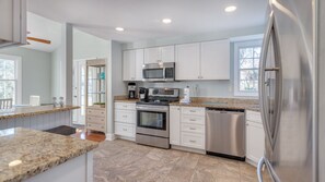 Spacious kitchen with stainless steel appliances