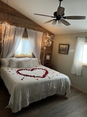 *upgrade to our romance package: receive rose petals on the bed