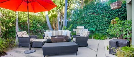 Lounge the day away in this tropical backyard.