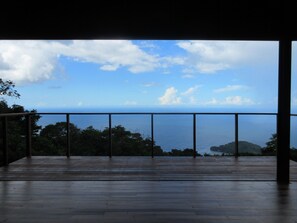 View from the front deck standing in the living room.