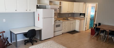 Office space for work for home option. Fridge, stove, microwave and kitchen sink