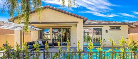 Access to pool from living room and primary bedroom suite