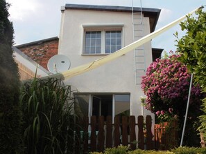 Apartment im Nebengelass mit Terrasse