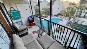 Screened patio overlooking the pool
