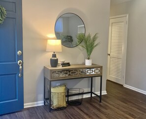 Front entrance and door to laundry 