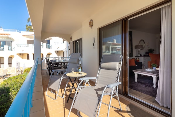 Large terrace overlooking the pool area offering the perfect setting to relax
