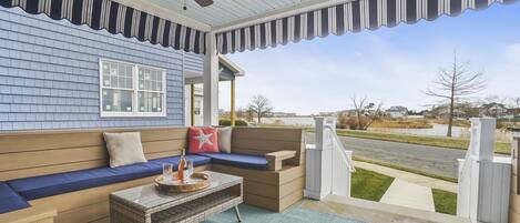 Enjoy drinks on the large porch with plentiful seating