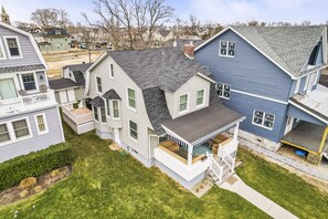 Large porch, 3-car garage with add'l 3 spaces, deck, bonus room and more.
