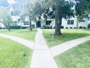 Straight ahead is the front door of the condo. 