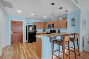 Full kitchen with bar seating