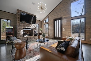 Modern and chic design inside, with views from the tall windows