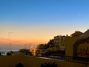Crescent moon. Sunset in the Algarve. Ocean view...from your apartment terrace.