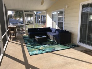 324 sq ft. screened-in back porch. 