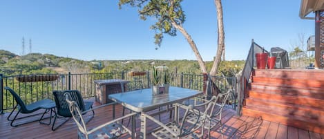 Dual level deck with gorgeous views & propane fireplace.