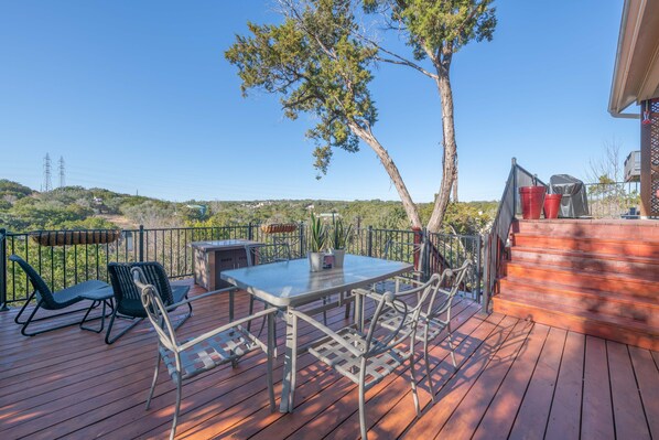 Dual level deck with gorgeous views & propane fireplace.