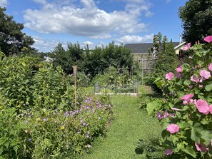 Lower vegetable and flower, herb garden with inner harbor and marina 