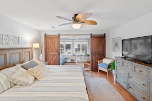 Master Bedroom with beautiful sunroom / home office w/ couch and desk space