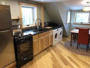 New fully stocked kitchen with brand new appliances and washer & dryer