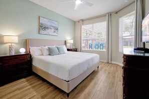 Master Bedroom #1 - Located on the main floor with pool view. King bed.