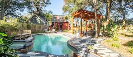 Guests at House of Meesh have access to the gardens, pool, jacuzzi, fire pit and outdoor seating/lounging.