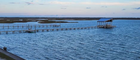 NEW! 240’ private covered fishing dock with green fishing lights underneath