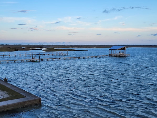 NEW!  240’ private covered fishing dock with green fishing lights underneath 