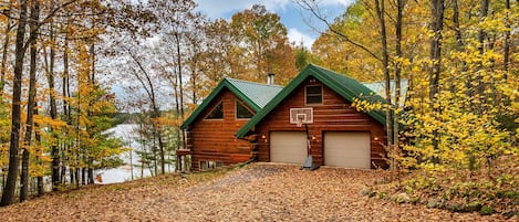 sideview of the cabin including basketball net