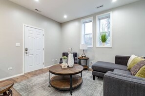 Living Room / Fully stocked kitchen