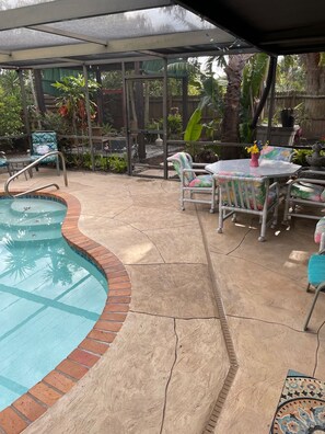 Pool with patio table area 