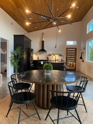 Dining and kitchen flow together, making it easy to entertain. 
