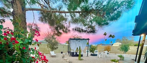 The relaxing back yard offers a view of Shaw Butte Mountain