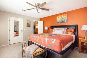 Large owner suite with private bathroom and a kitchenette/office area.  Also, bedroom has door to the backyard.