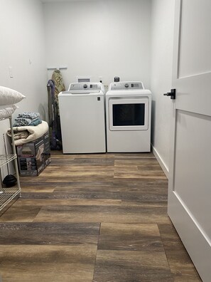 Large laundry room fully stocked
