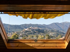 Sky, Cloud, Food, Plant, Tableware, Table, Window, Mountain, Fruit, Wood