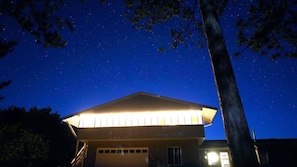 Front of the house when lights are on porch