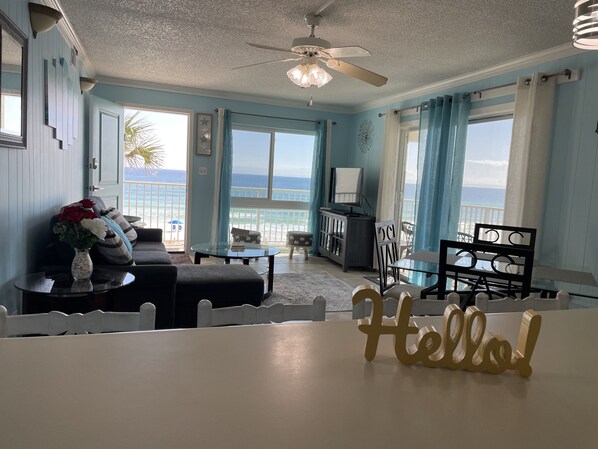 Living room with beach view and private balcony