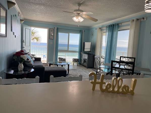 Living room with beach view and private balcony