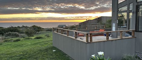 Enjoy the expansive deck and blue water view at sunrise or just for the day.
 