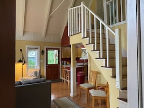 living room with huge windows, nice view, and lots of light