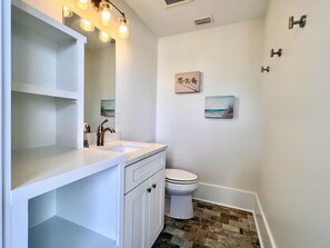 Pool level powder room