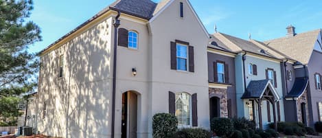 Beautiful end unit townhome with small side yard.