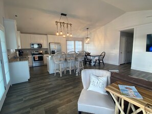 Kitchen, dining, and sitting area