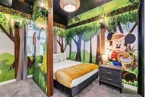 Step into the world of mickey mouse in this playful themed bedroom of the condo in Kissimmee Florida - Experience the joy of childhood nostalgia in our charming Mickey Mouse  - Offering plenty of space with inviting double bed