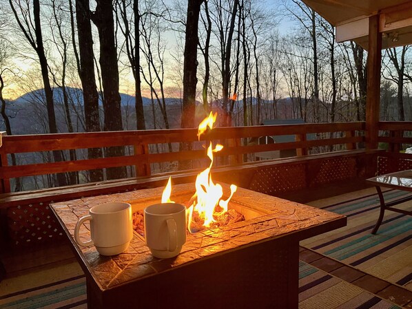 Propane fire pit and a sunset on a winter evening.