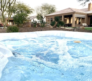 75 jet jacuzzi next to the pool